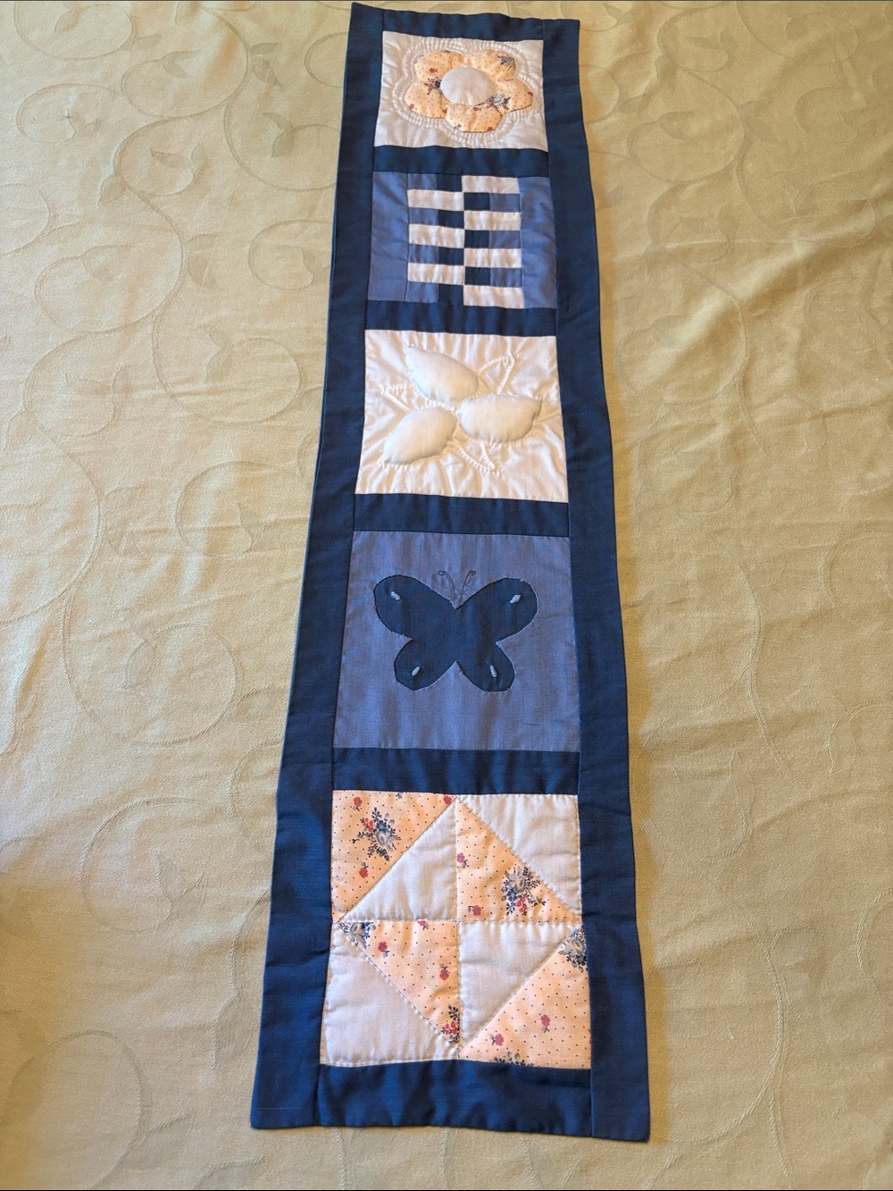 Vintage quilted wall hanging